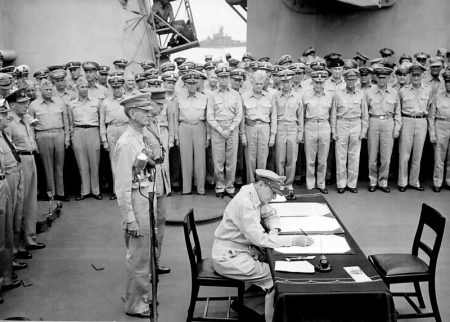 Gen.-Douglas-MacArthur-signs-surrender-wiki-450x322.jpg